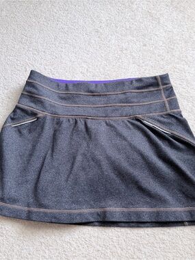 Athleta charcoal gray skater skirt with purple trim